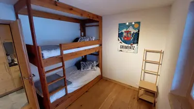 Ein Bett oder Betten in einem Zimmer der Unterkunft Agréable appartement à Grimentz, au pied des pistes