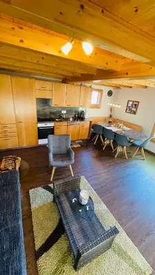 Ein Sitzbereich in der Unterkunft Chalet Sträba