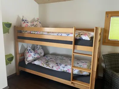 Ein Bett oder Betten in einem Zimmer der Unterkunft Chalet Sträba