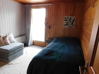 Ein Bett oder Betten in einem Zimmer der Unterkunft Chalet Bortergade