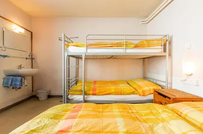 Ein Bett oder Betten in einem Zimmer der Unterkunft Happy Inn Lodge