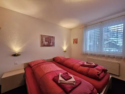 Ein Bett oder Betten in einem Zimmer der Unterkunft Felskinn 2. OG