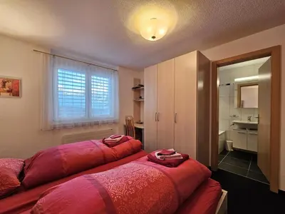 Ein Bett oder Betten in einem Zimmer der Unterkunft Felskinn 2. OG