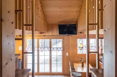 TV/Unterhaltungsangebot in der Unterkunft Eigerhome - The Cottage mit Wellness - GRIWA RENT AG
