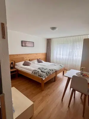 Ein Bett oder Betten in einem Zimmer der Unterkunft Appartements Elan