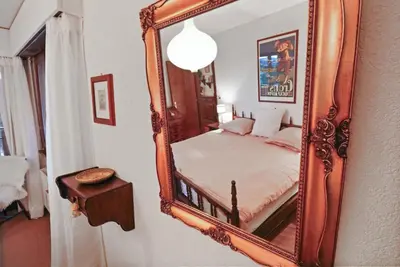 Ein Bett oder Betten in einem Zimmer der Unterkunft Charmant appartement avec vue sur les montagnes