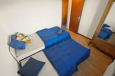 Ein Bett oder Betten in einem Zimmer der Unterkunft Logement spacieux et charmant