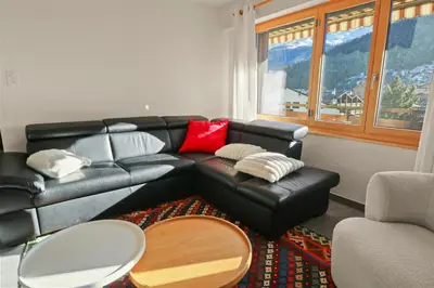 Ein Sitzbereich in der Unterkunft Logement spacieux et charmant