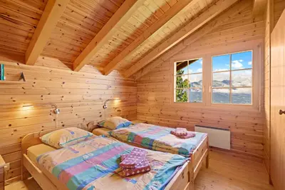 Ein Bett oder Betten in einem Zimmer der Unterkunft Felicitas - 7 pers - pres du centre