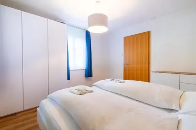 Ein Bett oder Betten in einem Zimmer der Unterkunft Chalet Wassermandli
