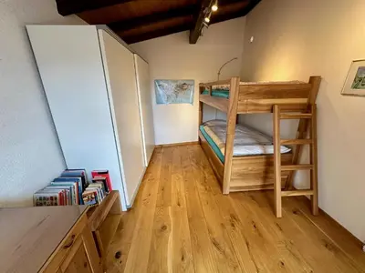 Ein Bett oder Betten in einem Zimmer der Unterkunft Chalet typique du Valais,Maison bio et bien-être!