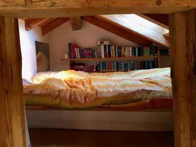 Ein Bett oder Betten in einem Zimmer der Unterkunft Chalet typique du Valais,Maison bio et bien-être!