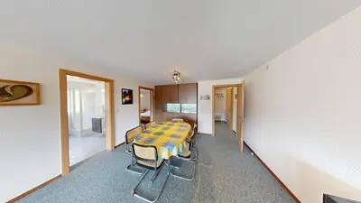 Ein Sitzbereich in der Unterkunft Floralpina FL1