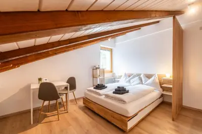 Ein Bett oder Betten in einem Zimmer der Unterkunft Studio Mundizia