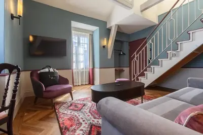 Ein Sitzbereich in der Unterkunft Hotel Mürren Palace
