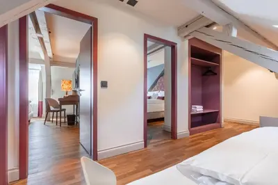 Ein Bett oder Betten in einem Zimmer der Unterkunft Hotel Mürren Palace