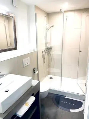 Ein Badezimmer in der Unterkunft Modern designed, luxury mountain view Apartment