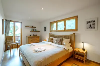 Ein Bett oder Betten in einem Zimmer der Unterkunft Chalet Aquila 5
