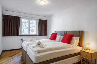 Ein Bett oder Betten in einem Zimmer der Unterkunft Post Residence 5