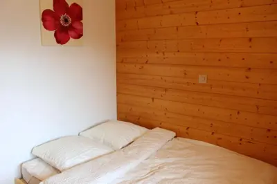 Ein Bett oder Betten in einem Zimmer der Unterkunft Chalet Amos