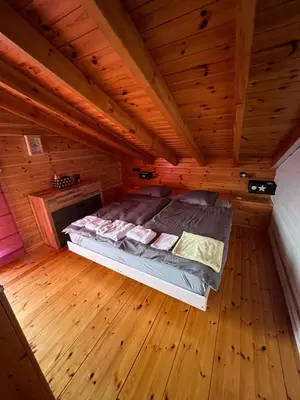 Ein Bett oder Betten in einem Zimmer der Unterkunft Superbe chalet 12 personnes vue imprenable 2nuits min