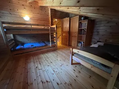 Ein Bett oder Betten in einem Zimmer der Unterkunft Superbe chalet 12 personnes vue imprenable 2nuits min