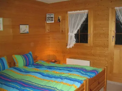 Ein Bett oder Betten in einem Zimmer der Unterkunft Chalet Verano