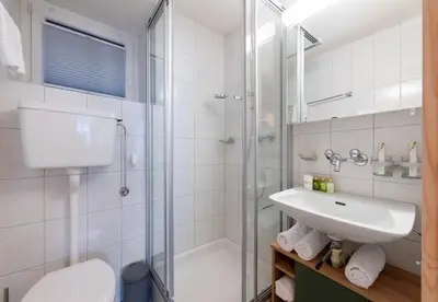 Ein Badezimmer in der Unterkunft Chalet Lobhornblick