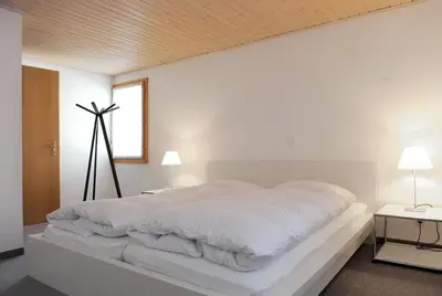 Ein Bett oder Betten in einem Zimmer der Unterkunft Apartment Lenkstrasse 6 C
