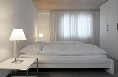 Ein Bett oder Betten in einem Zimmer der Unterkunft Apartment Lenkstrasse 6 C