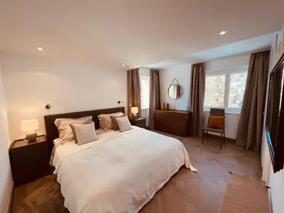 Ein Bett oder Betten in einem Zimmer der Unterkunft Exclusive Comfy Apartment in Central Crans-Montana