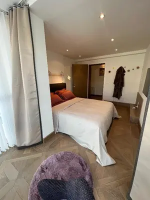 Ein Bett oder Betten in einem Zimmer der Unterkunft Exclusive Comfy Apartment in Central Crans-Montana