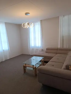 Ein Sitzbereich in der Unterkunft Mon Amour Apartment
