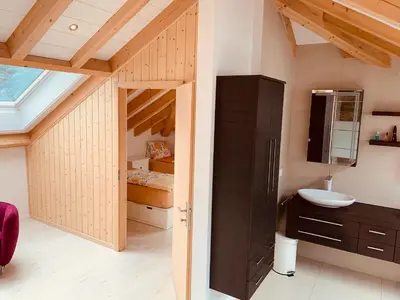 Ein Bett oder Betten in einem Zimmer der Unterkunft Al Porto Fantastic Lake & Mountain View Apartment