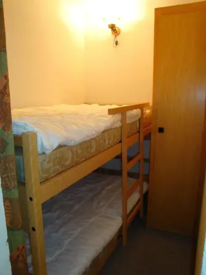 Ein Bett oder Betten in einem Zimmer der Unterkunft Apartment Grand Vallon