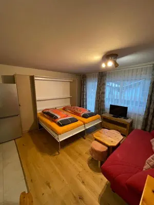 Ein Bett oder Betten in einem Zimmer der Unterkunft Montanji 11