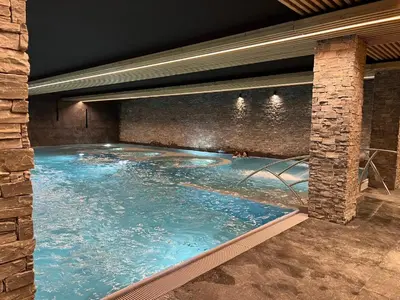 Der Swimmingpool an oder in der Nähe von Cosy studio for 4 near ski lift, HAMEAU C13