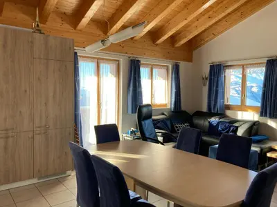 Ein Sitzbereich in der Unterkunft Chalet Lalula