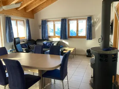Ein Sitzbereich in der Unterkunft Chalet Lalula