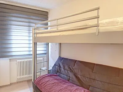 Ein Bett oder Betten in einem Zimmer der Unterkunft Apartment Violettes-Vacances B Apt- 429 by Interhome