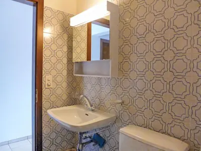 Ein Badezimmer in der Unterkunft Apartment Merises 20 by Interhome
