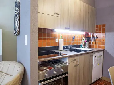 Küche/Küchenzeile in der Unterkunft Apartment Immeuble Rond-Point Apt- 11 by Interhome