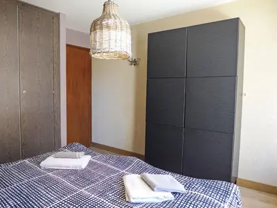 Ein Bett oder Betten in einem Zimmer der Unterkunft Apartment Immeuble Rond-Point Apt- 11 by Interhome