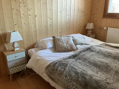 Ein Bett oder Betten in einem Zimmer der Unterkunft Chalet Privé avec vue imprenable sur les alpes