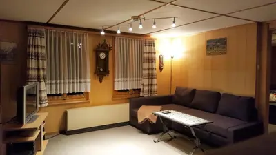 Ein Sitzbereich in der Unterkunft Chalet Spillstatt