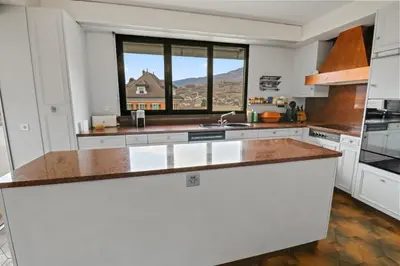 Küche/Küchenzeile in der Unterkunft Appartement au coeur du vignoble