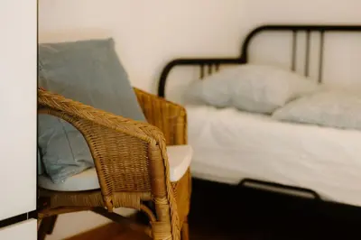 Ein Bett oder Betten in einem Zimmer der Unterkunft Bijou Niesenblick - traumhafter Seeblick - nahe Interlaken - idyllisch