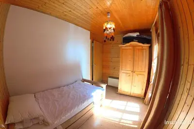 Ein Bett oder Betten in einem Zimmer der Unterkunft Stecaya Face à la piste de l'Aigle