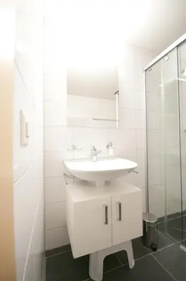 Ein Badezimmer in der Unterkunft Alpbachstrasse 4, Meiringen