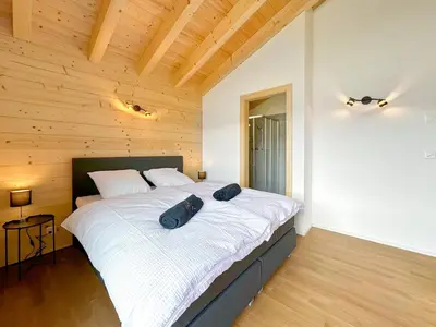 Ein Bett oder Betten in einem Zimmer der Unterkunft My Mountain Paradise - Swiss Alps